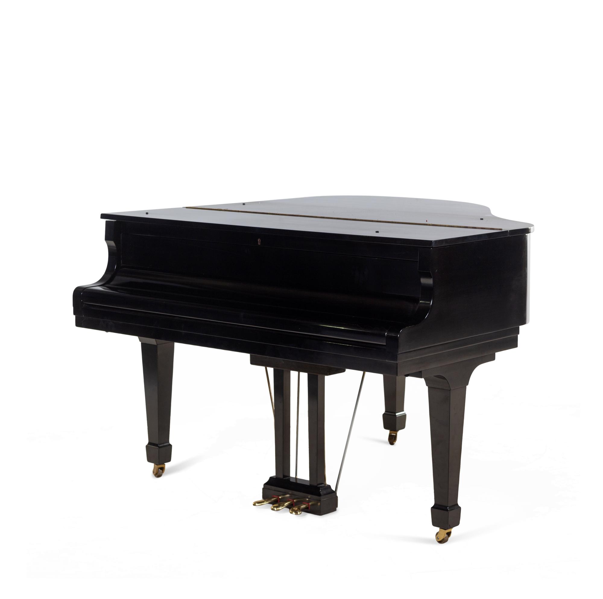 A Kawai Black Lacquered Baby Grand Piano
