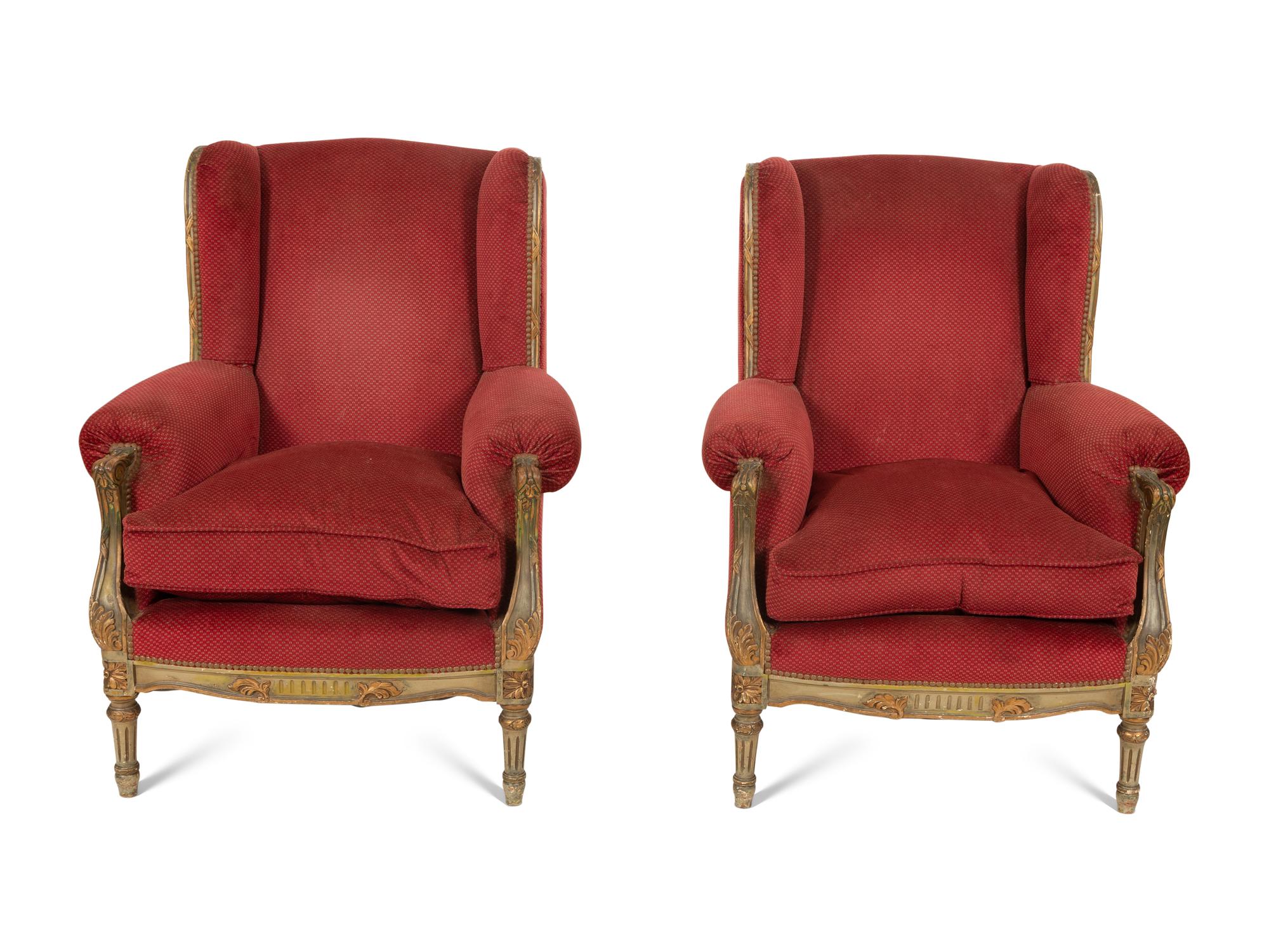 A Pair of Louis XVI Style Painted and Parcel Gilt Bergères à Oreille Attributed to Maison Jansen