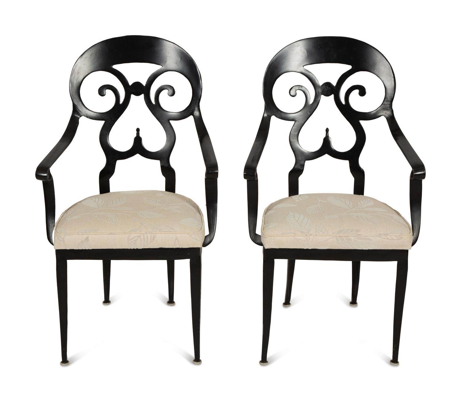 A Pair of Black Painted Metal Armchairs