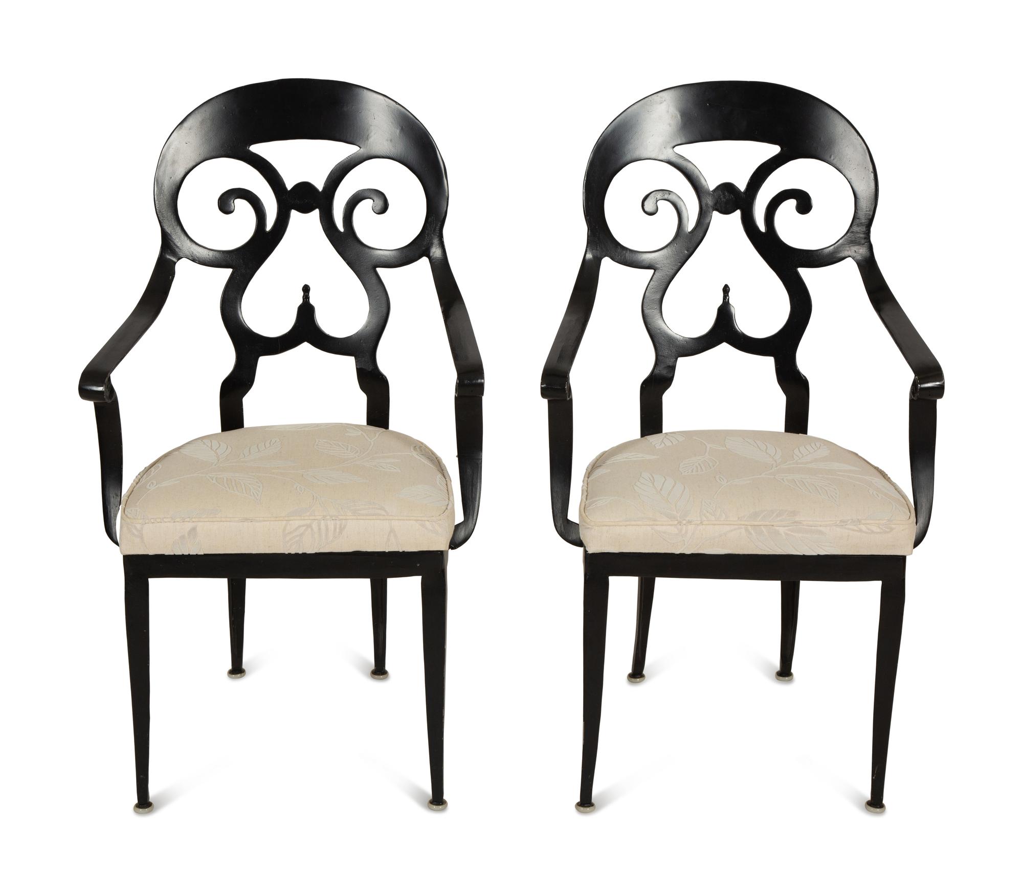 A Pair of Black Painted Metal Armchairs