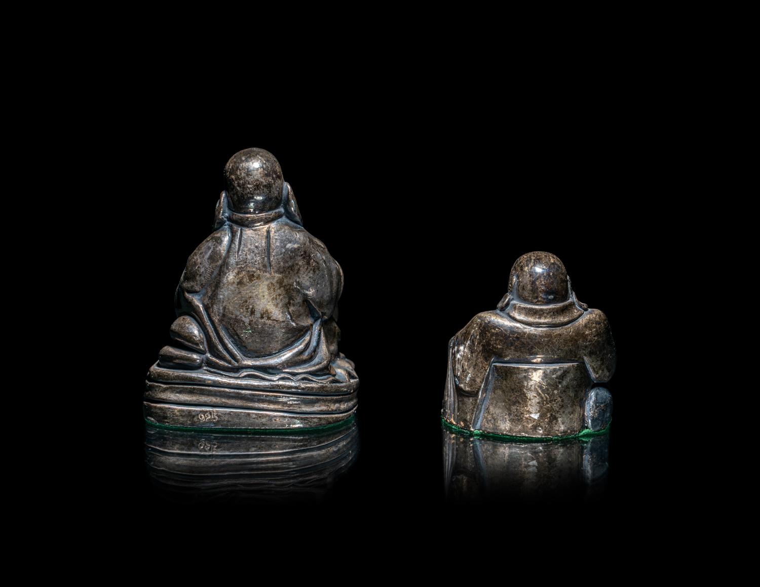 Two Silver Figures of Laughing Buddha