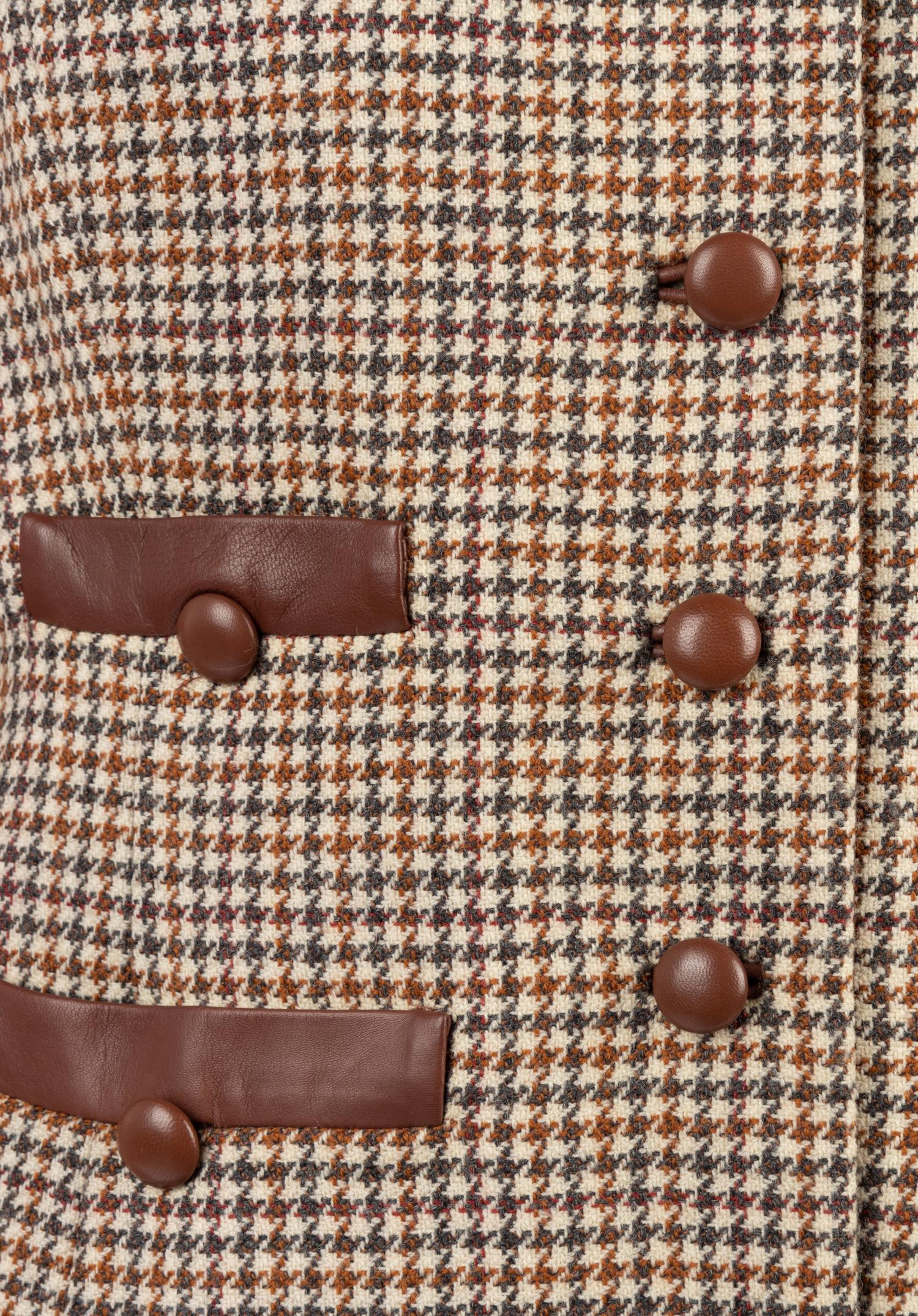 Four Houndstooth Pieces: One Oscar de la Renta Two-Piece Skirt Suit, One Hermes Jacket, One Ralph Lauren Cape