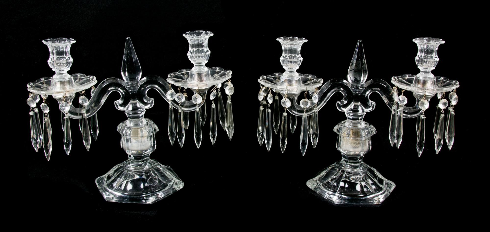 A Pair of Molded Glass Two-Light Candelabra Height of tallest 10 3/8 inches.