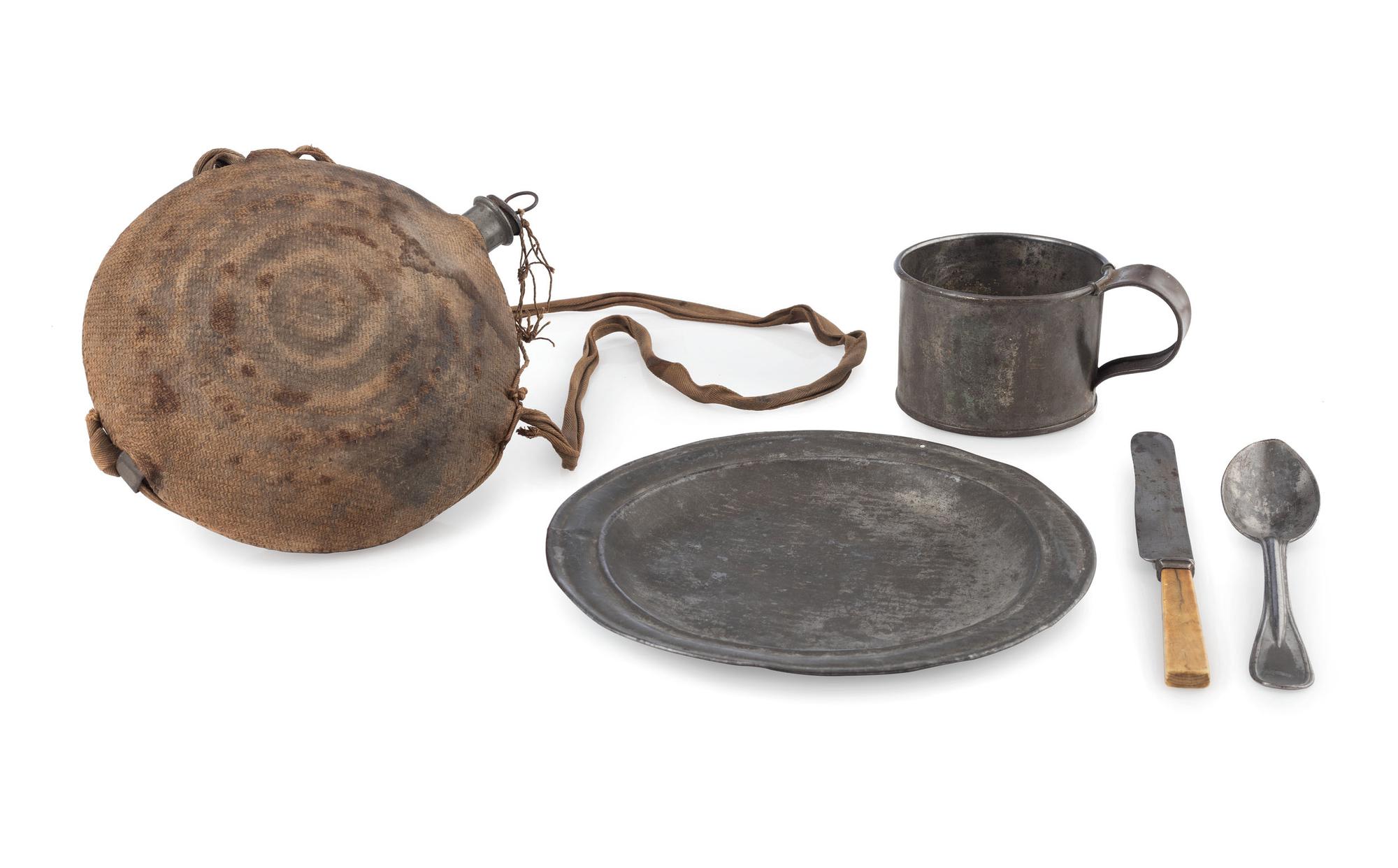 A group of items identified to Private William H. Shaver, Battery M, 2nd Pennsylvania Heavy Artillery, highlighted by war-date tintypes, CDVs, and army mess gear.