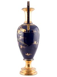 An Art Nouveau Parcel Gilt and Polychrome Decorated Vase