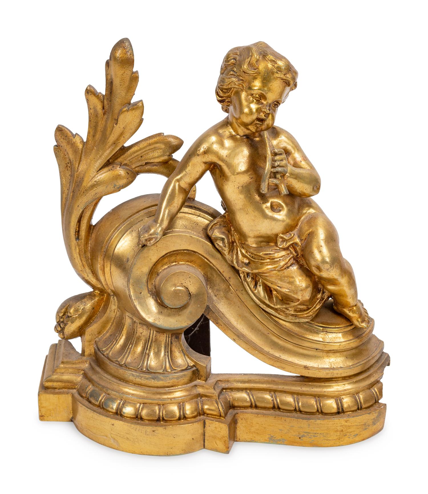 A Louis XV Style Gilt Bronze Four-Piece Fireplace Set
