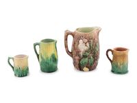 A Group of Nine Majolica Pitchers