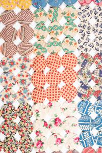 A Pieced Cotton Yo-Yo Quilt