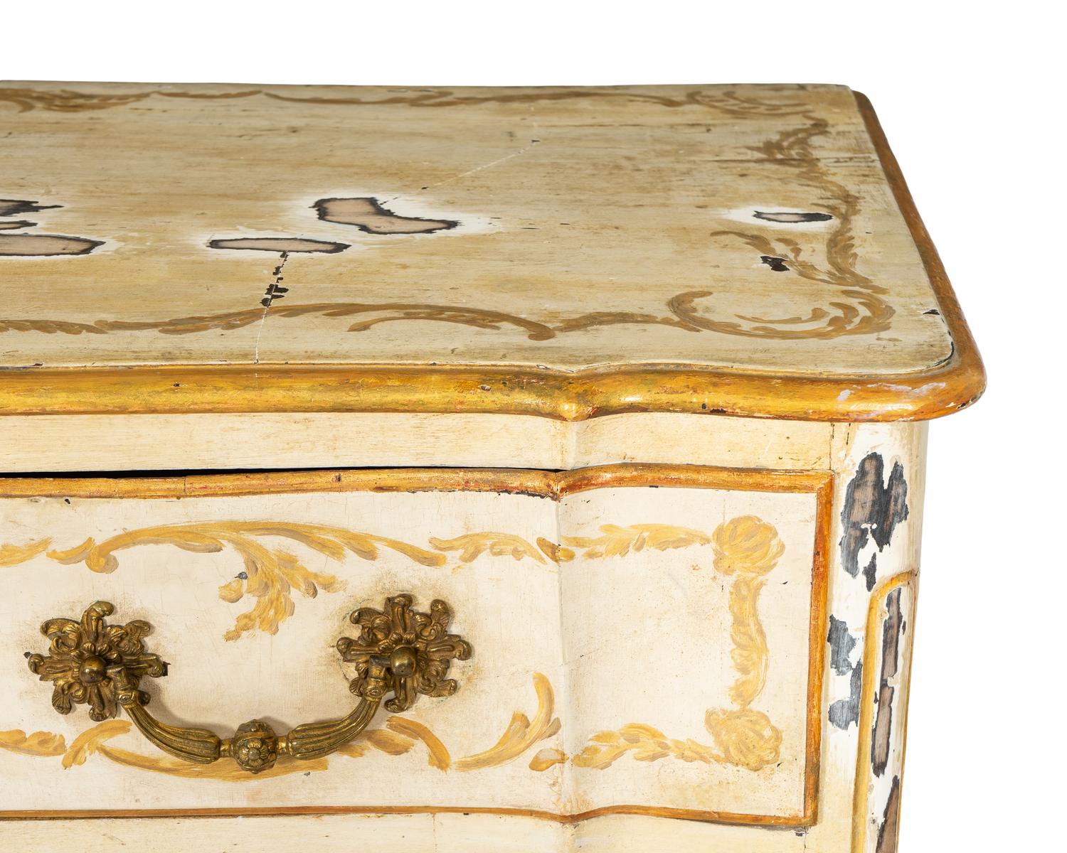 A Louis XV Paint Decorated and Parcel Gilt Walnut Commode