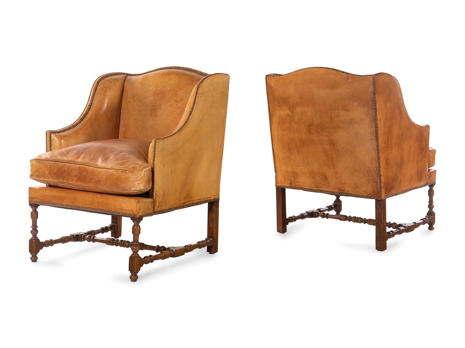 A Pair of William and Mary Style Leather-Upholstered Wingback Armchairs