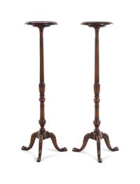 A Pair of George III Style Carved Mahogany Jardiniere Pedestals