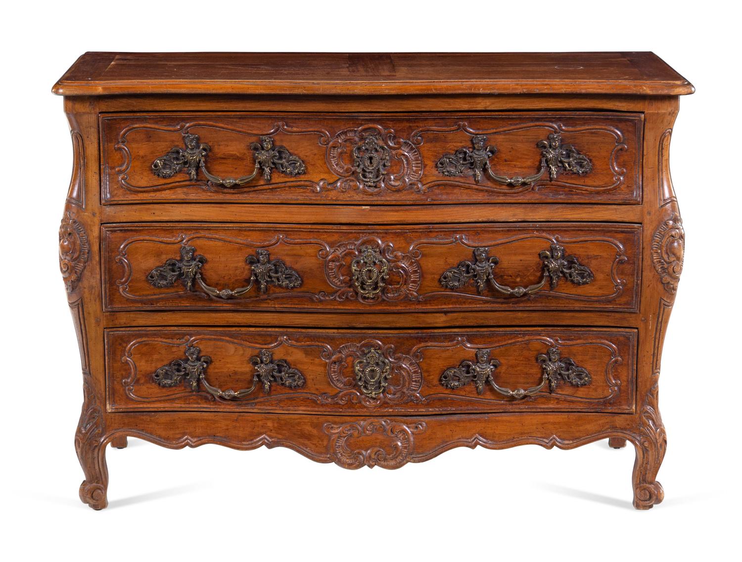A Louis XV Provincial Style Walnut Commode