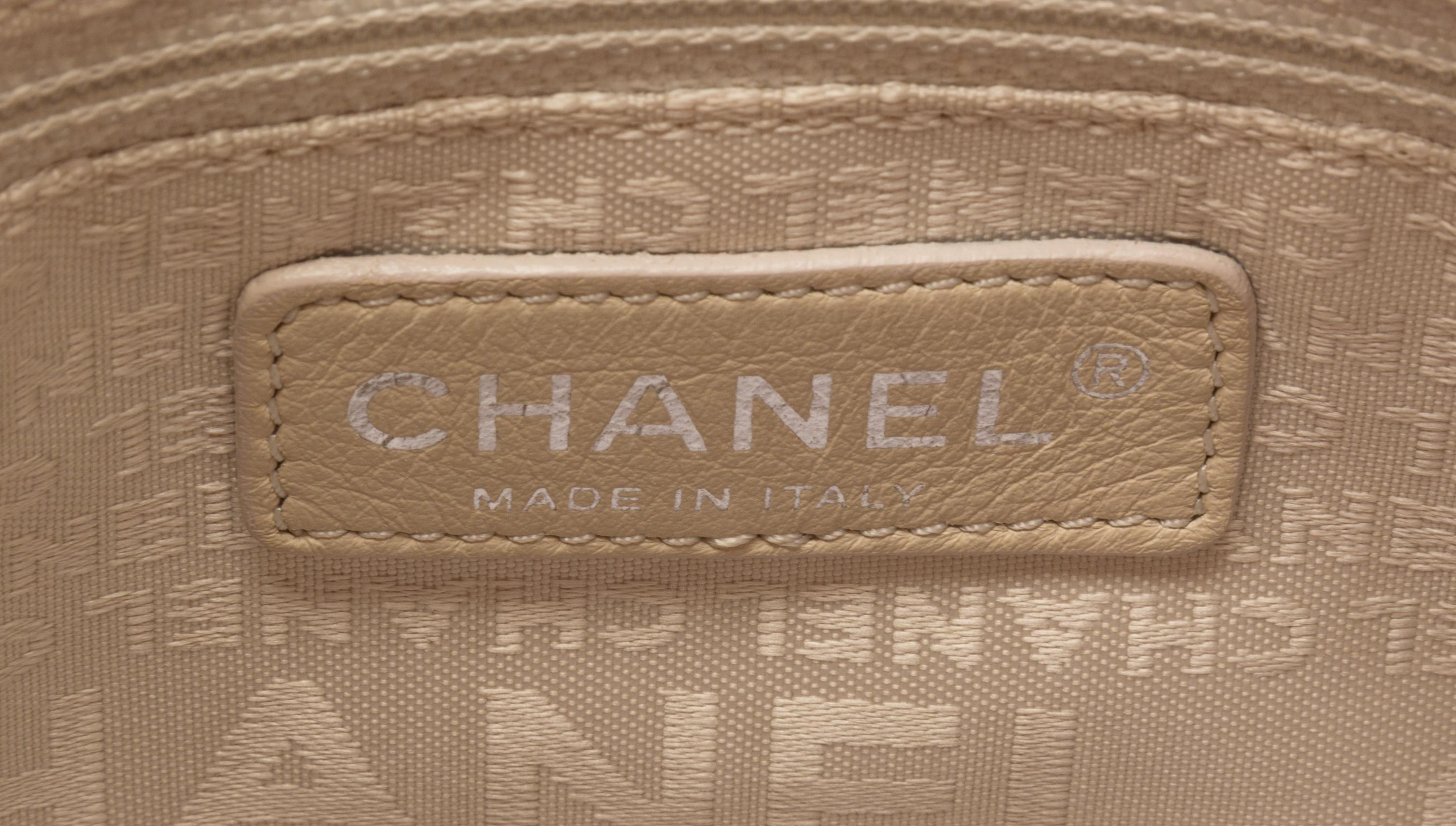 A Chanel Pink Calfskin Leather Fold Over Handbag, 12.5" x 11" x 4".