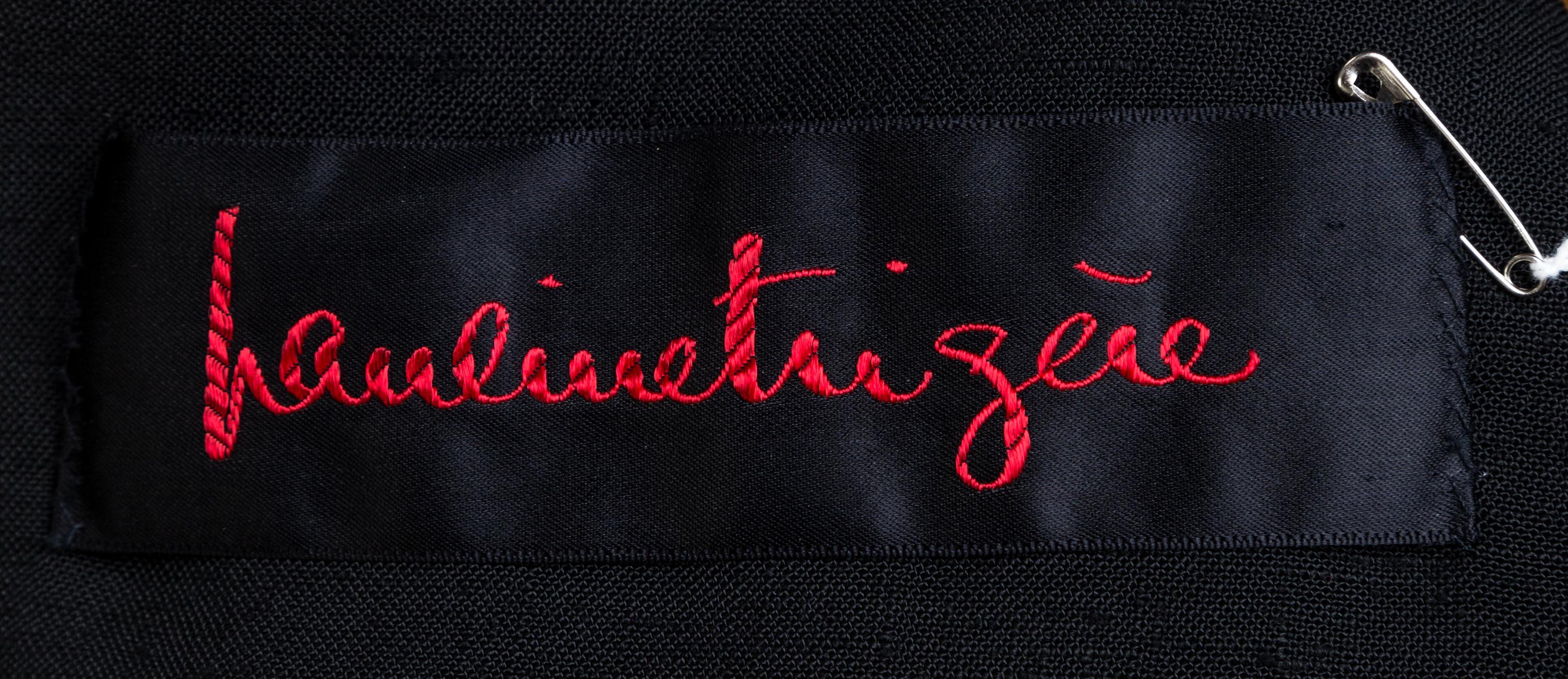 A Pauline Trigere Black Sleeveless Vest and Skirt Set, No size.