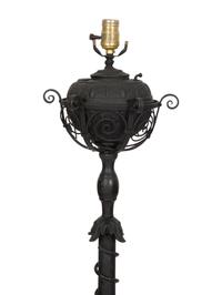 A Painted Wrought Iron Torchère Mounted as a Floor Lamp