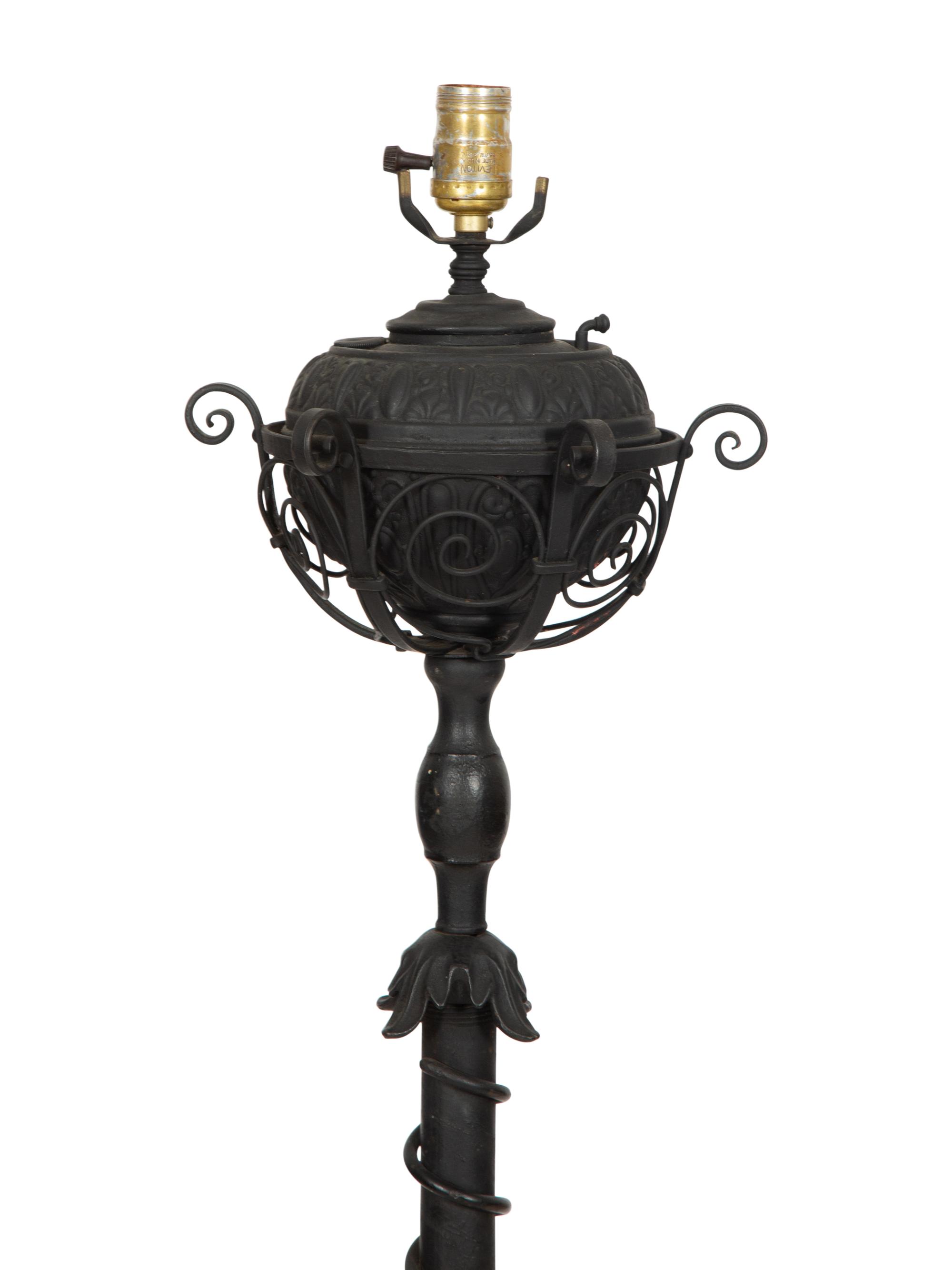 A Painted Wrought Iron Torchère Mounted as a Floor Lamp