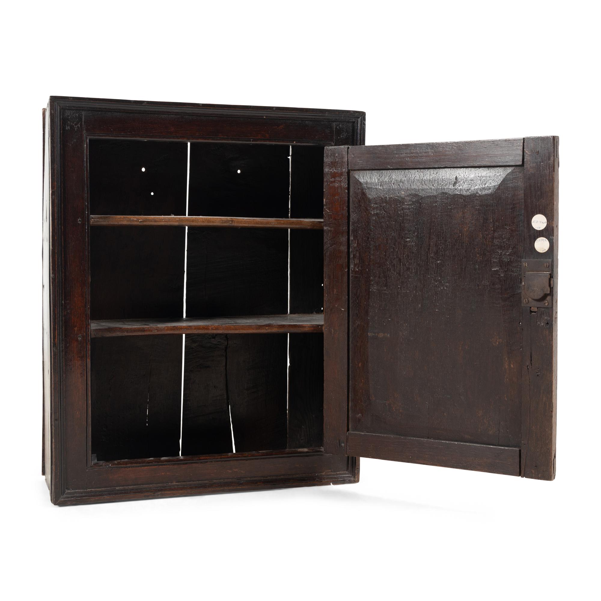 A Charles II Oak Hanging Cabinet