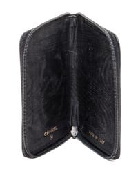 A Chanel Black Caviar Leather Coin Purse, 4.5" x 3.5" x 5".