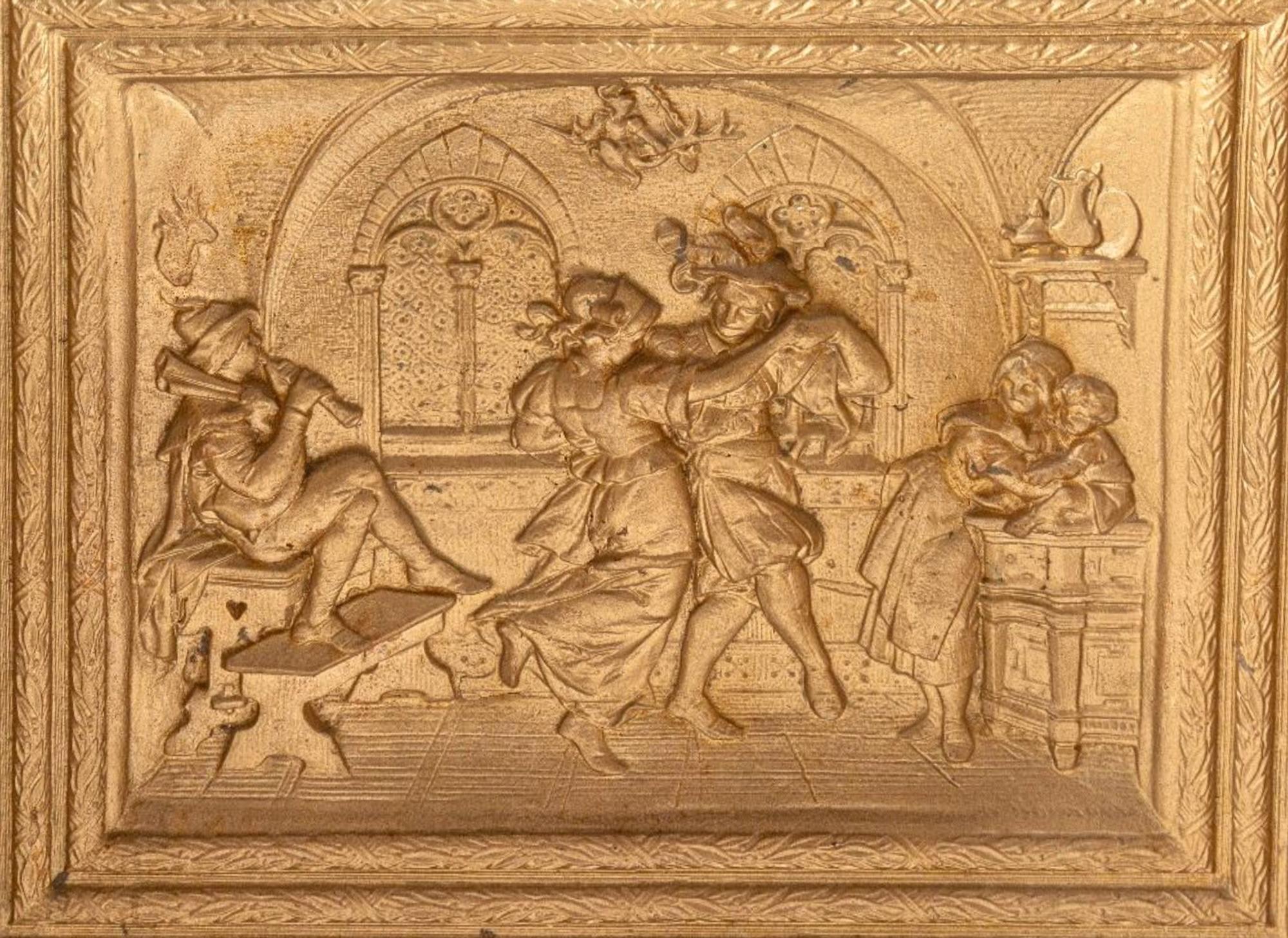 A Three-Panel Gilt Decorated Cast Iron Fireback