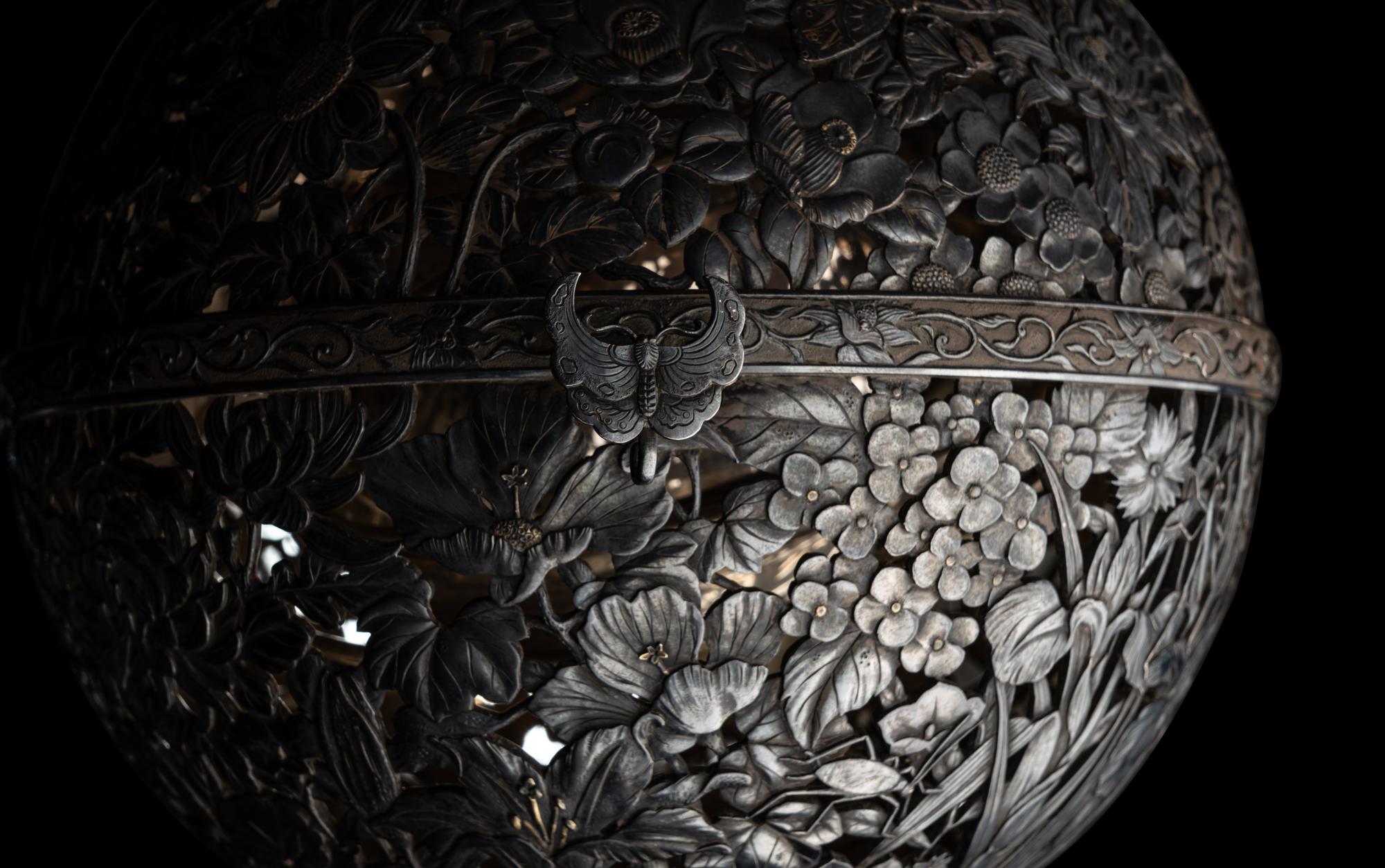 A Japanese Silver and Parcel Gilt Hanging Incense Ball
