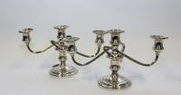 A Pair of American Silver Three-Light Candelabra, S. Kirk & Son, Baltimore, MD, having a central urn form cup issuing two twist arms wi