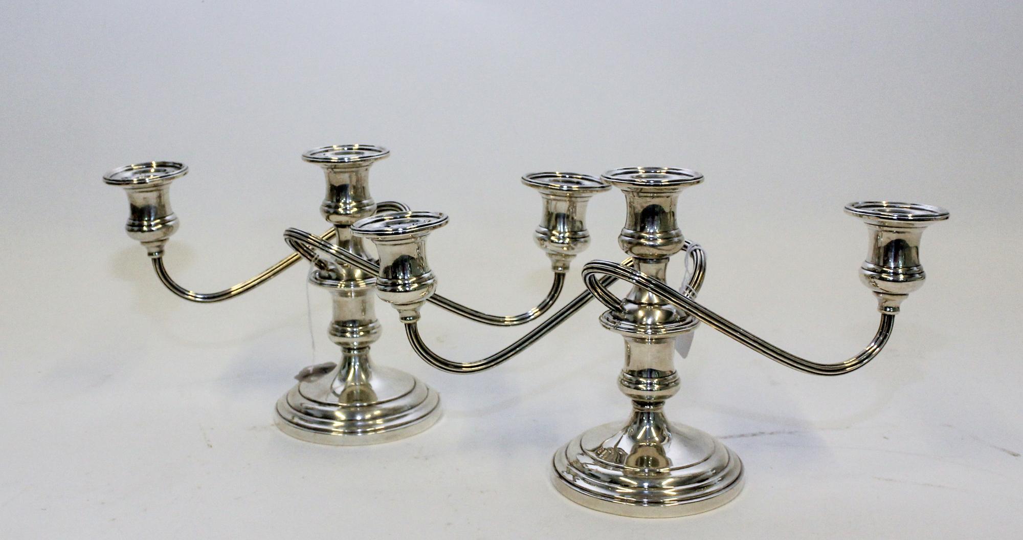 A Pair of American Silver Three-Light Candelabra, S. Kirk & Son, Baltimore, MD, having a central urn form cup issuing two twist arms wi