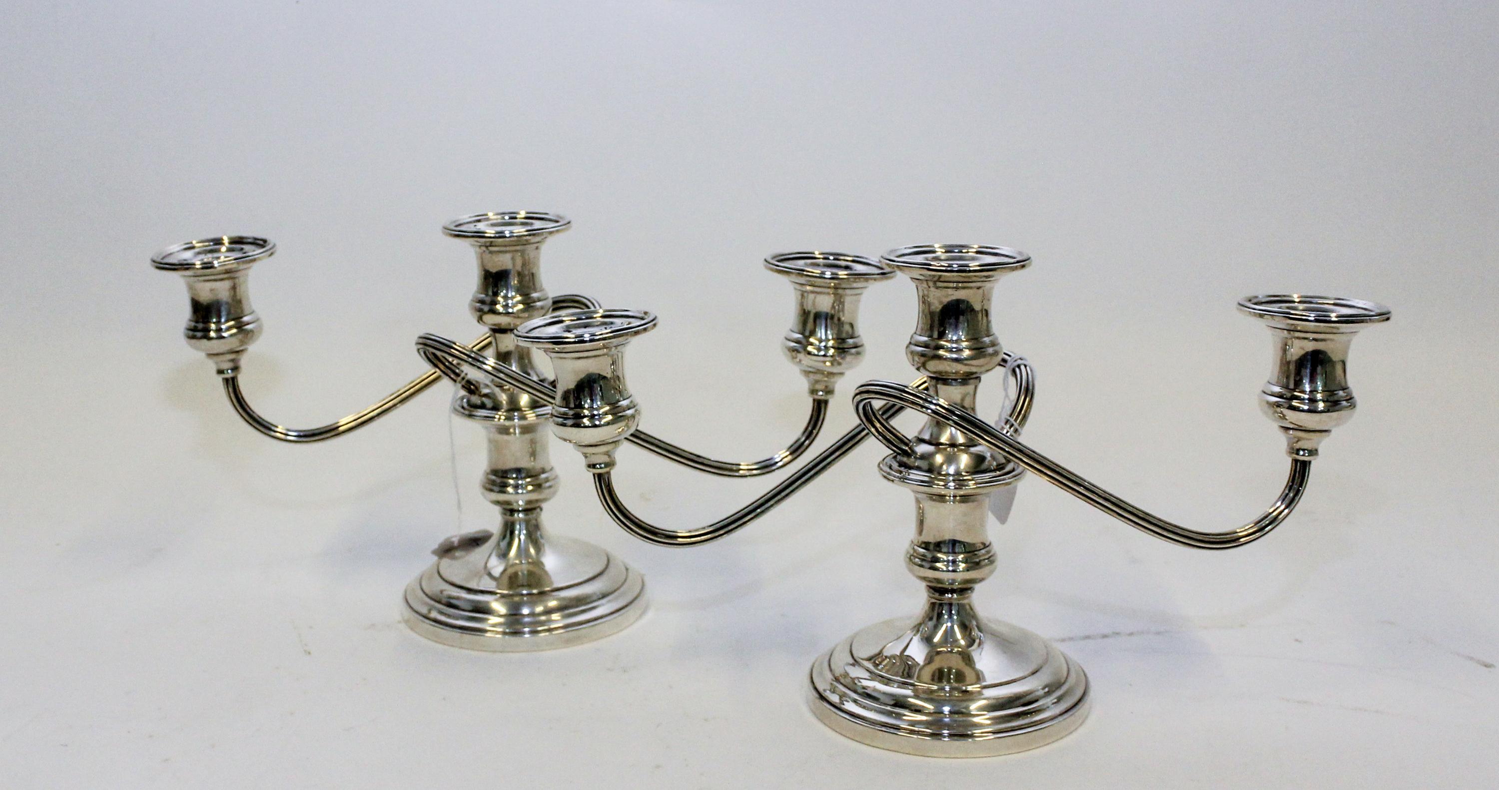 A Pair of American Silver Three-Light Candelabra, S. Kirk & Son, Baltimore, MD, having a central urn form cup issuing two twist arms wi