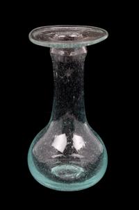 A Roman Glass Unguentarium Height 4 1/2 inches. — CIRCA 1ST-2ND CENTURY C.E.