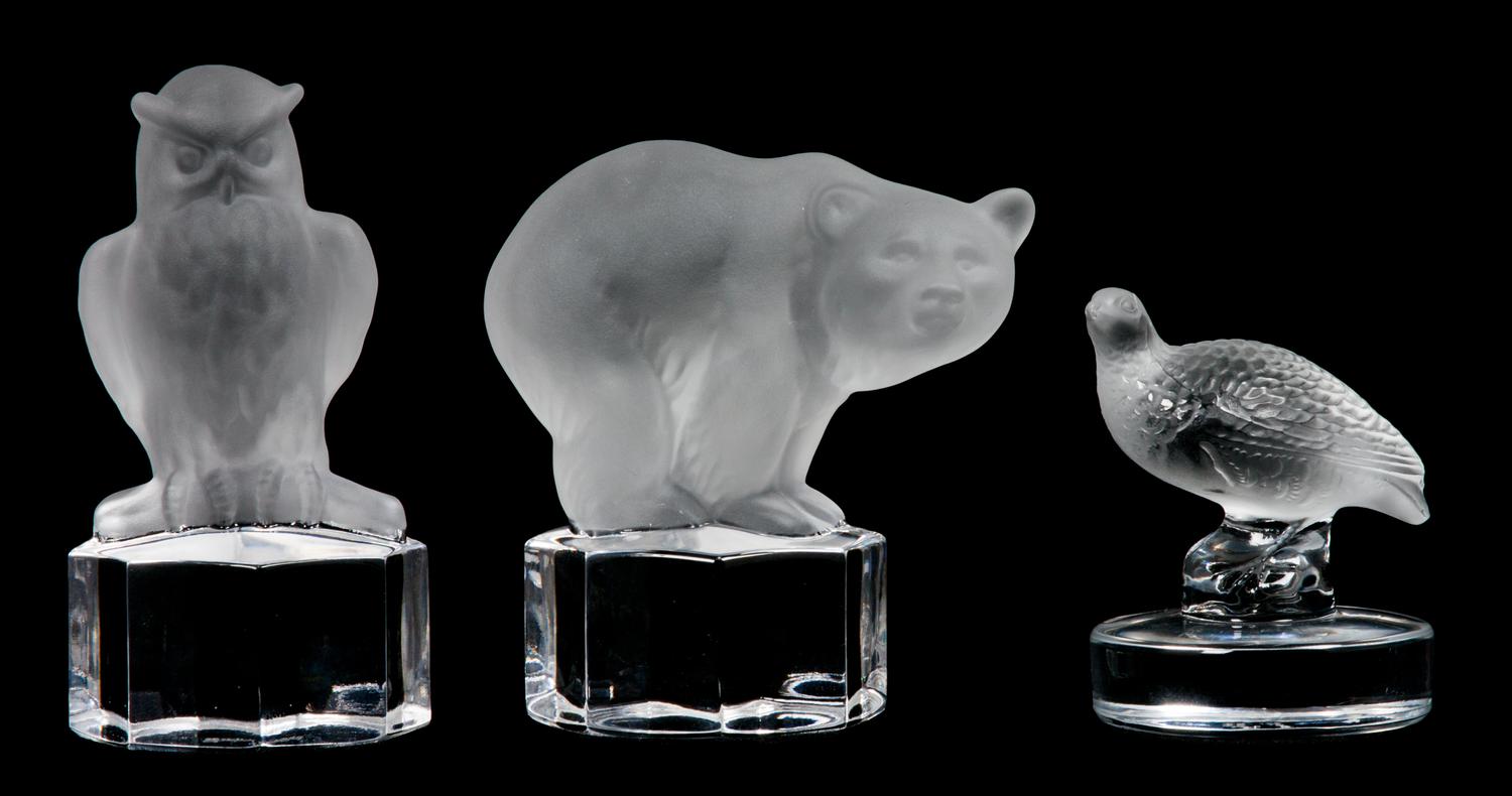 A Lalique Molded and Frosted Glass Paperweight Height of first 2 5/8 inches.