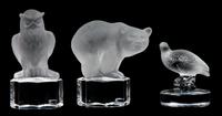 A Lalique Molded and Frosted Glass Paperweight Height of first 2 5/8 inches.