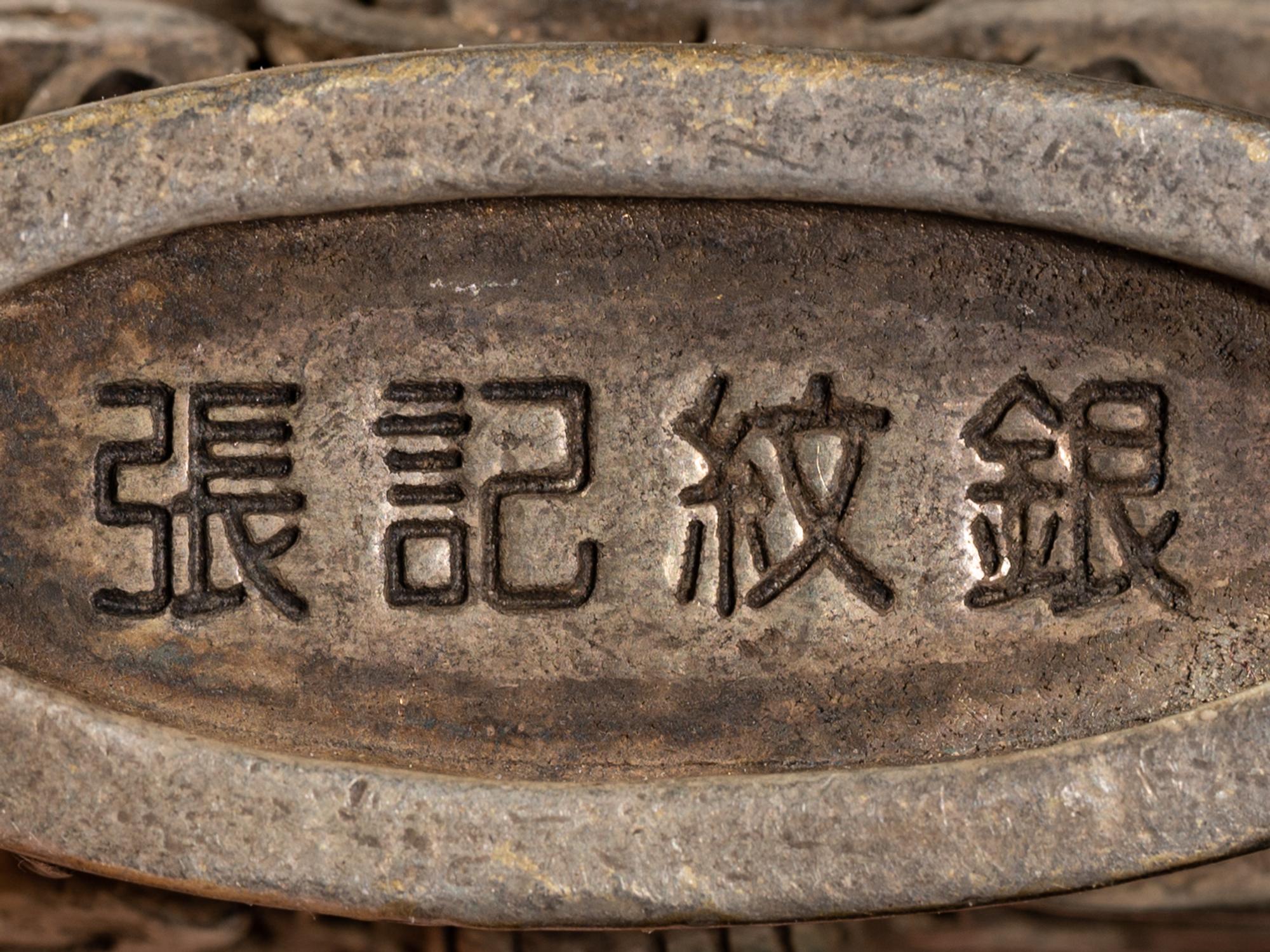 A Chinese Reticulated Silver Snuff Bottle