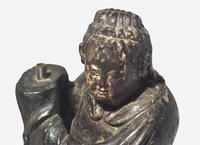 A Pair of Chinese Carved Wood Figural Candleholders