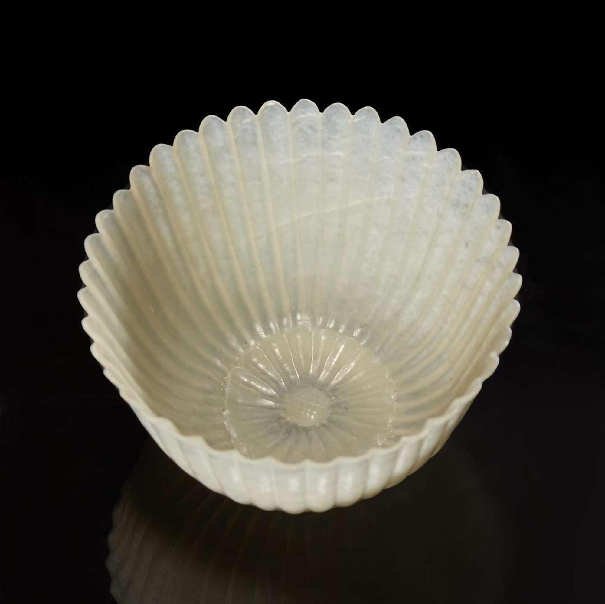 A Chinese carved white jade "Chrysanthemum" cup 玉雕薄胎菊花杯 Mid to late Qing dynasty ????