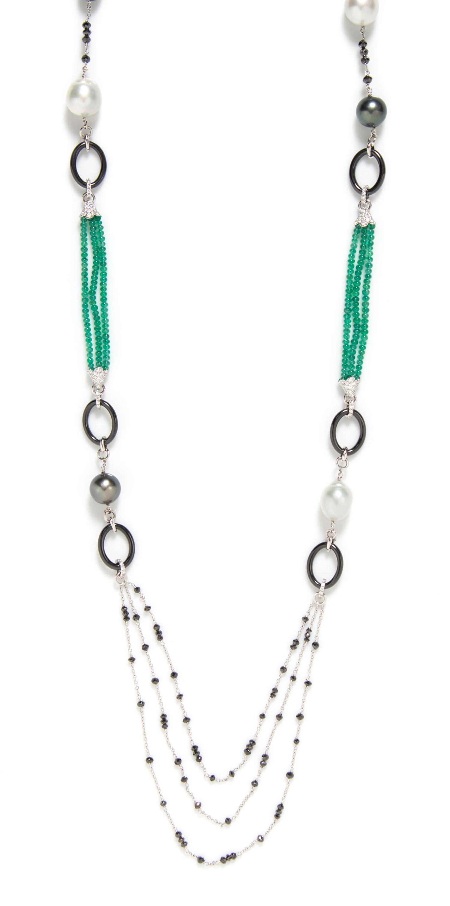 An 18 Karat White Gold, Cultured Pearl, Diamond, Black Diamond, Emerald and Onyx Longchain, 43.10 dwts.