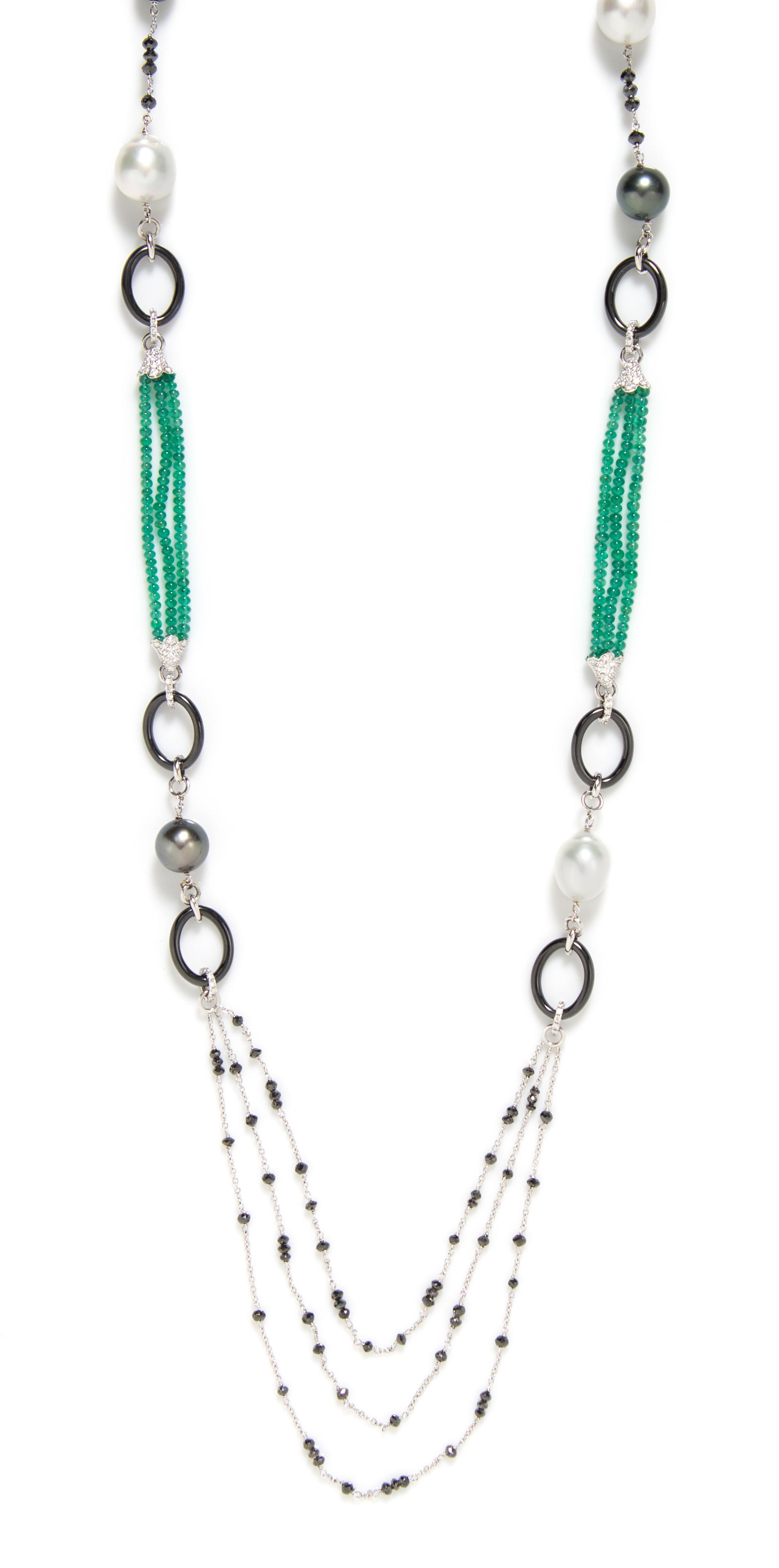 An 18 Karat White Gold, Cultured Pearl, Diamond, Black Diamond, Emerald and Onyx Longchain, 43.10 dwts.