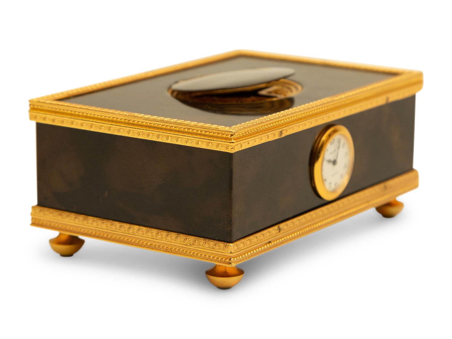 A Swiss Reuge Music Box with Bird Automaton and Clock — 20th Century