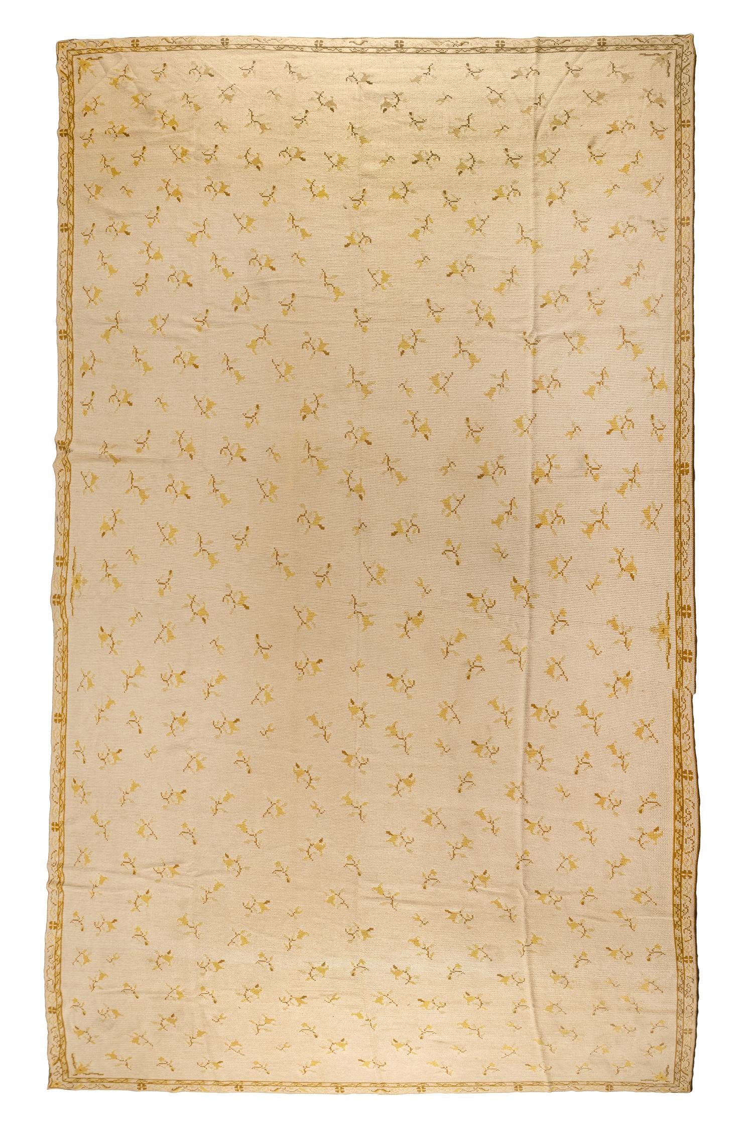 A Portuguese Needlepoint Rug