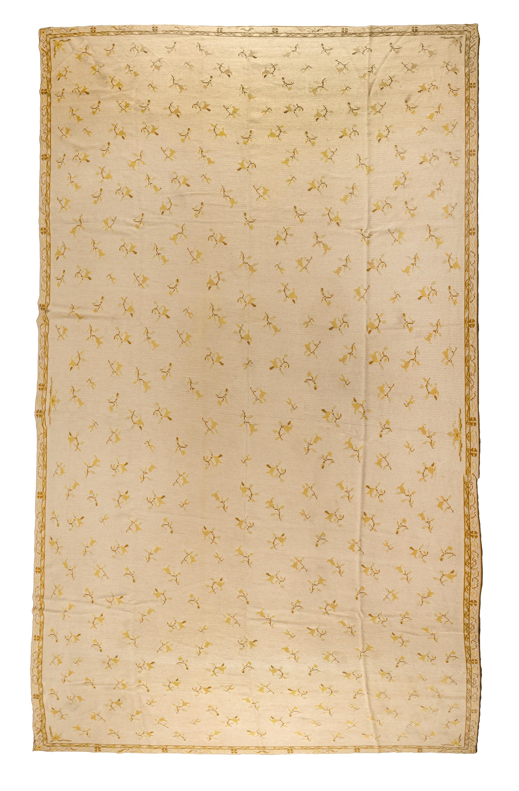 A Portuguese Needlepoint Rug