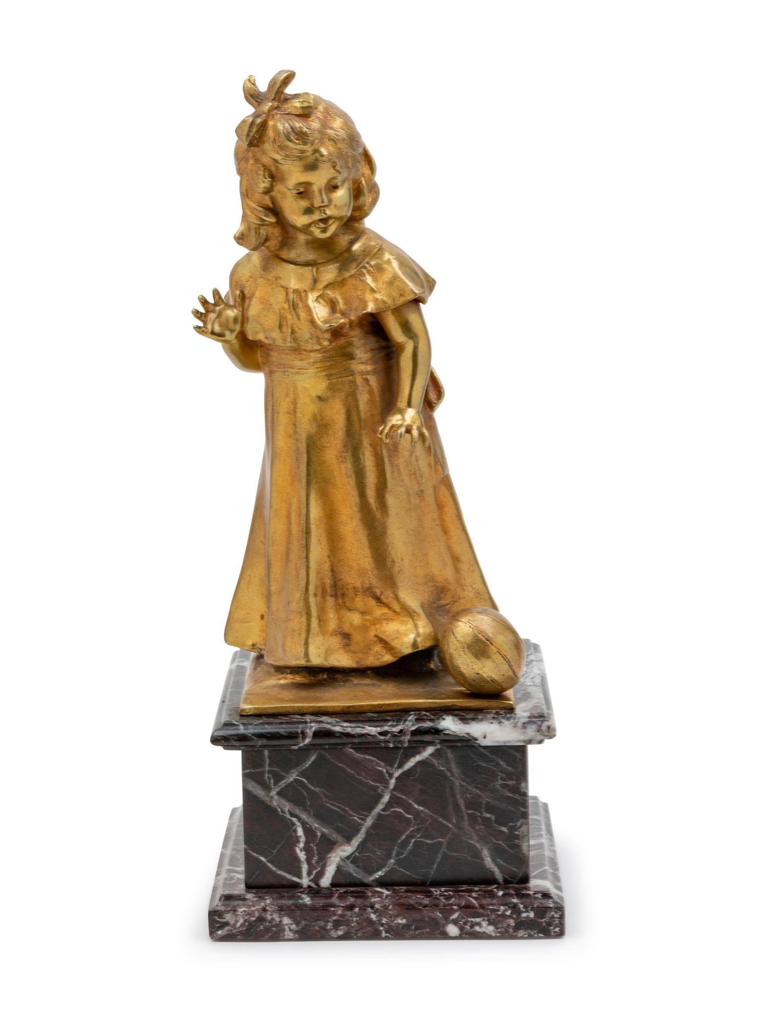 A Continental Gilt Bronze Figure of a Girl