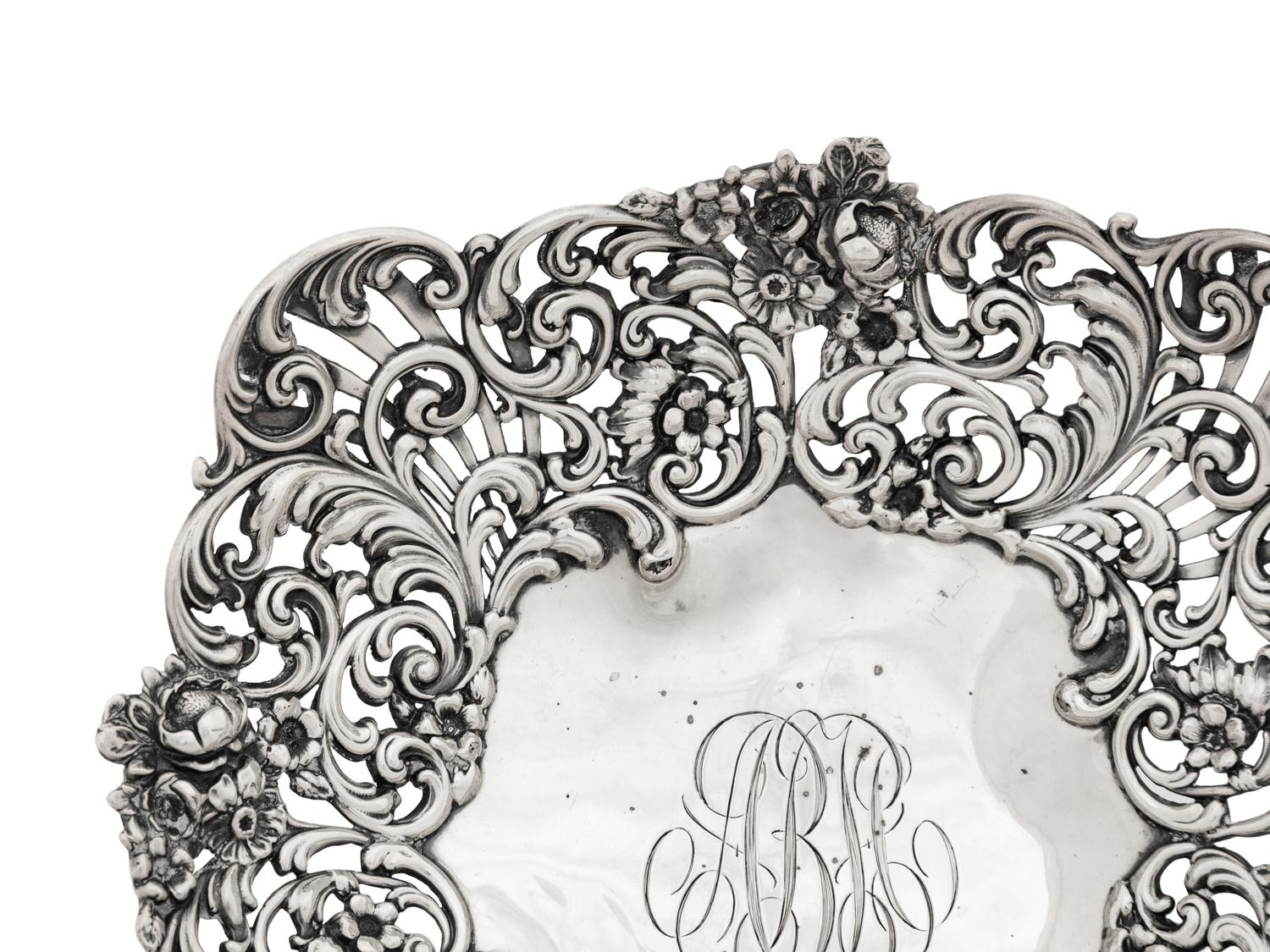 An American Silver Reticulated Bowl Raised on Ball Feet