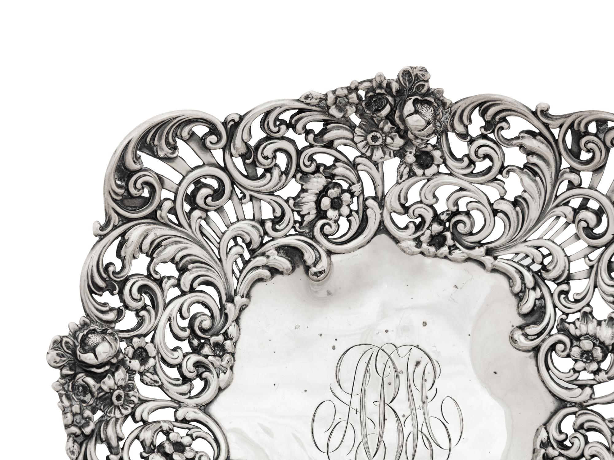 An American Silver Reticulated Bowl Raised on Ball Feet