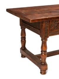 An Italian Baroque Style Walnut Table