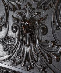A Renaissance Revival Carved Slant-Front Desk