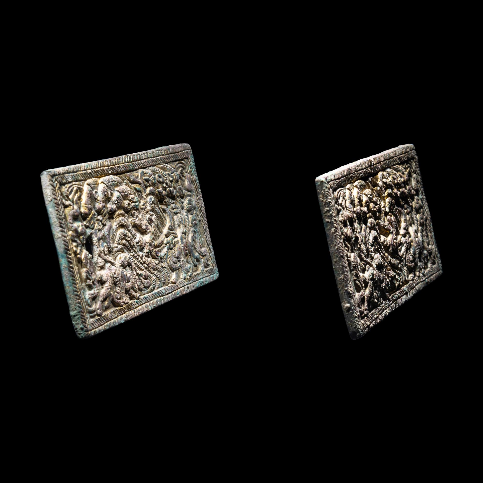 A Pair of Eurasian Gilt-Bronze Plaques