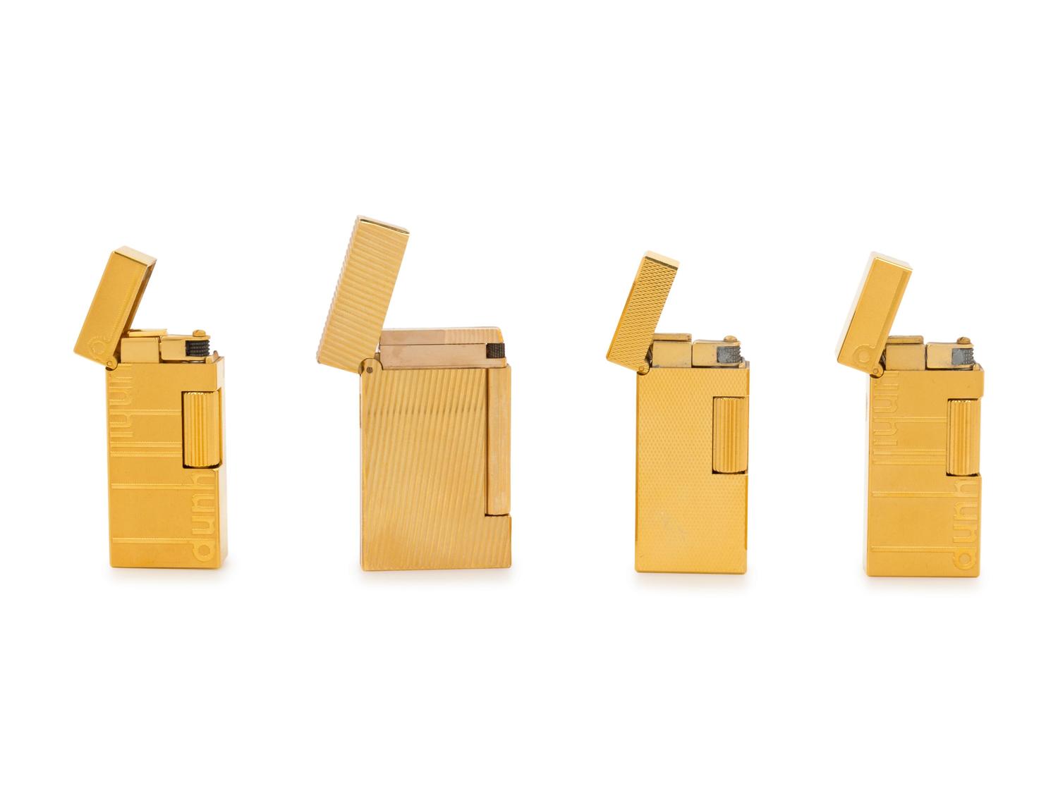A Group of Four Dunhill Gilt Metal Lighters
