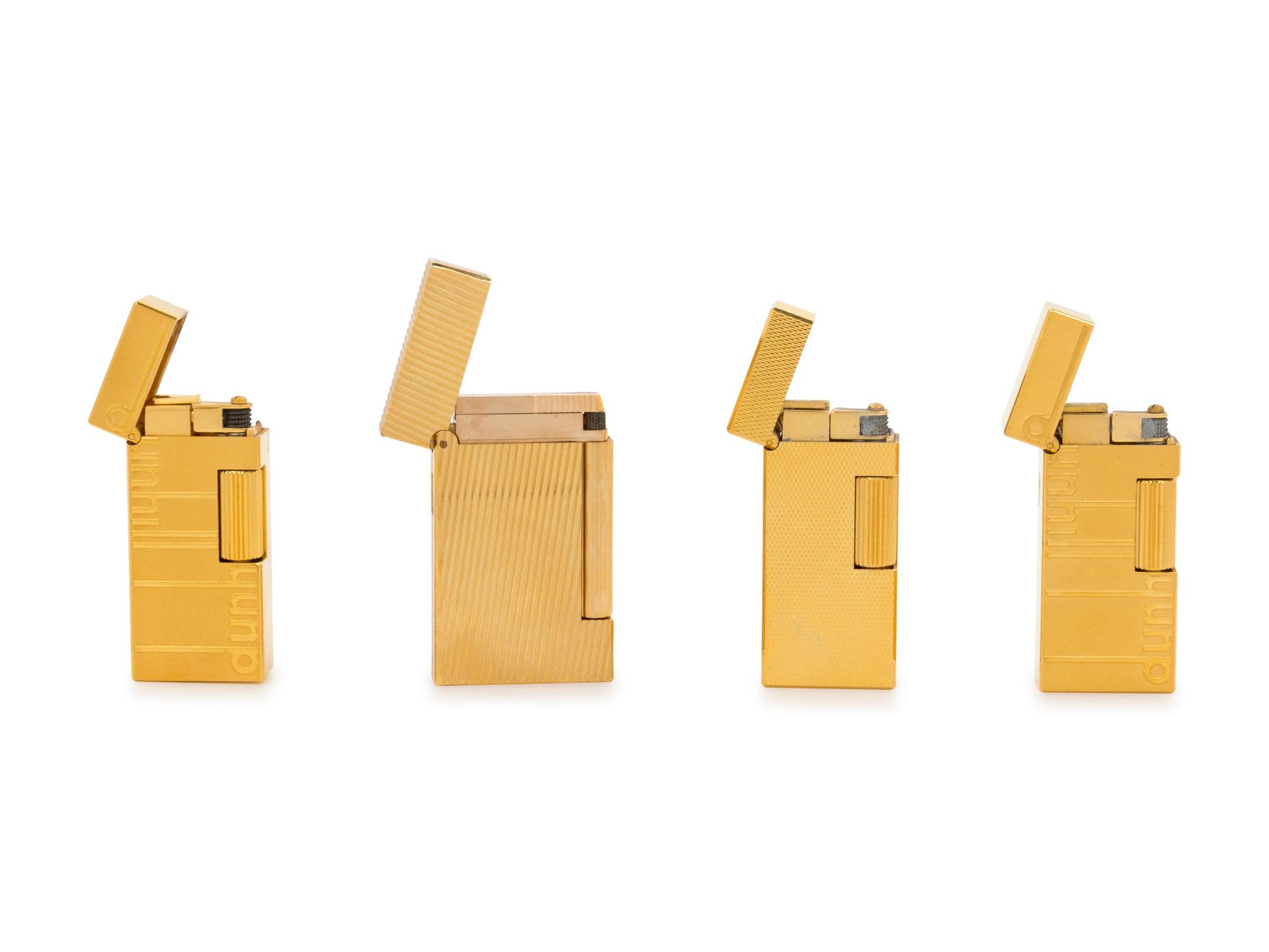 A Group of Four Dunhill Gilt Metal Lighters