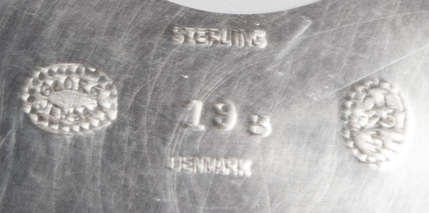 A Danish Silver Footed Louvre Bowl, Georg Jensen Silversmithy, Copenhagen, 1915-1930, #19B, having a serrated flared mouth raised on a