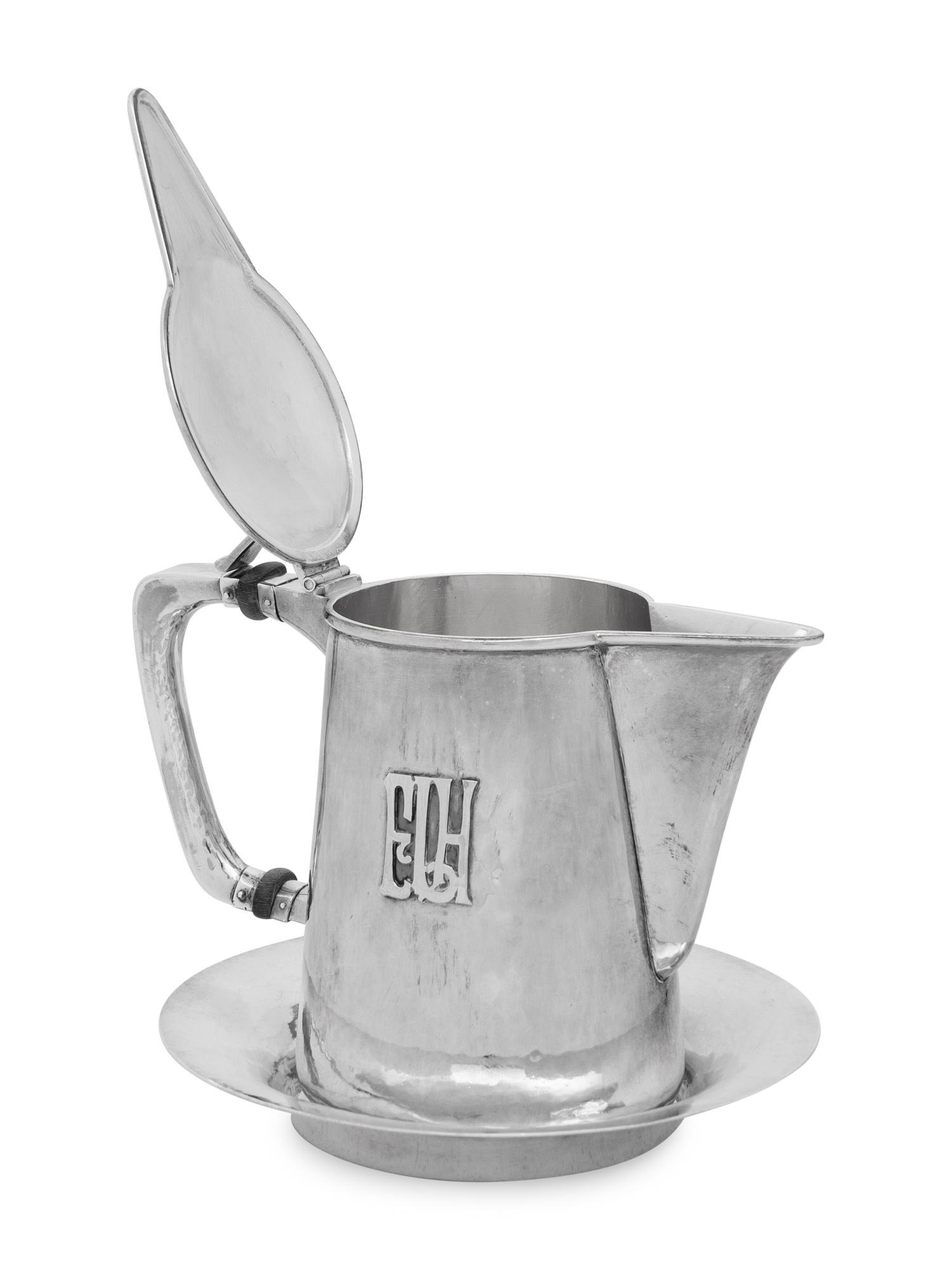 An American Arts and Crafts Silver Syrup Pitcher and Underplate