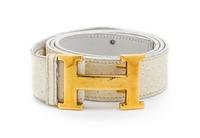 An Hermes White Embossed Leather Constance Belt, 33 1/2 inches.