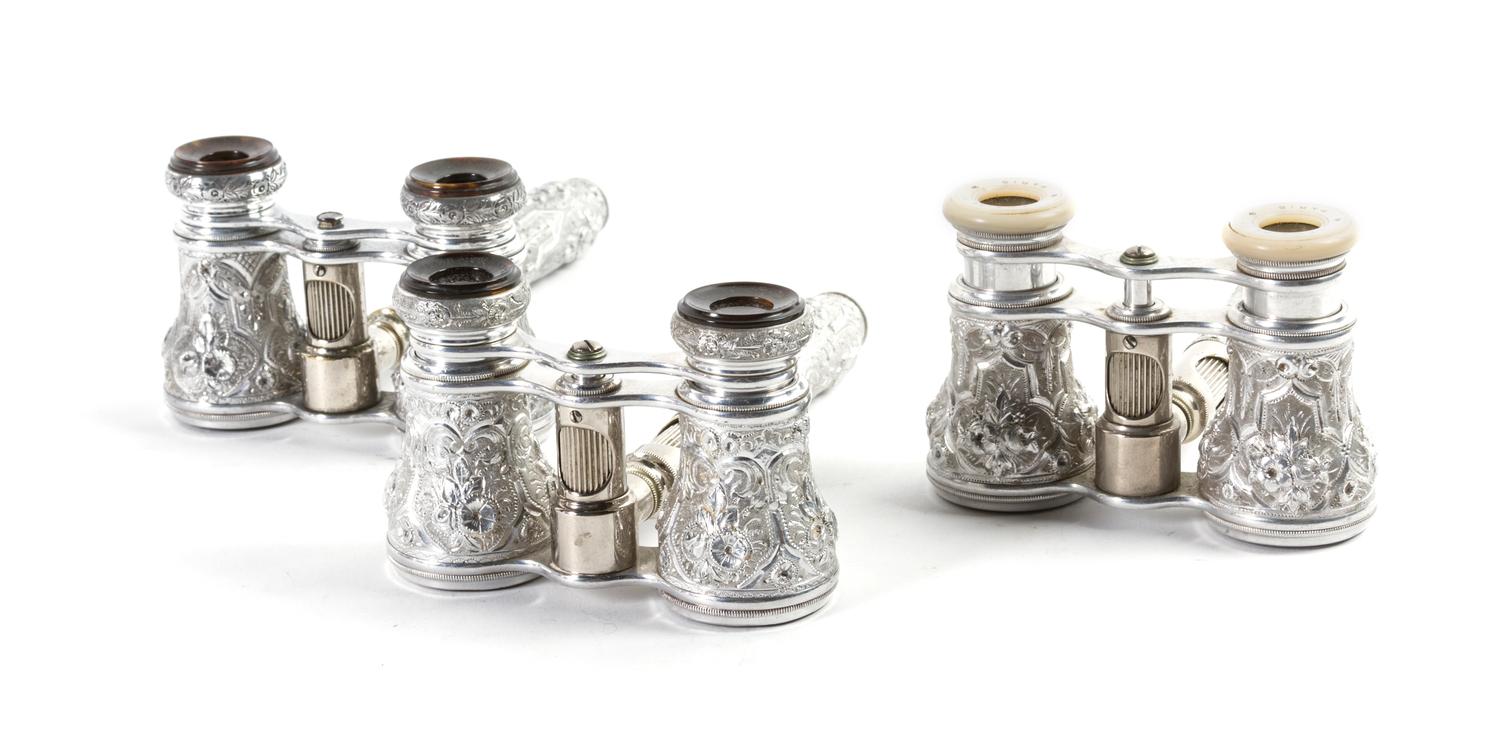 Three Pairs of French Bright Cut Aluminum Opera Glasses, Width 3 7/8 inches.